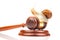 Snail and gavel of justice on a white background. The concept of slow adoption of laws and judicial decision. law and law in