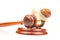 Snail and gavel of justice on a white background. The concept of slow adoption of laws and judicial decision. law and law in