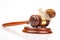 Snail and gavel of justice on a white background. The concept of slow adoption of laws and judicial decision. law and law in