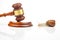 Snail and hammer of justice on a white background. The concept of slow adoption of laws and judicial decision. law and law in