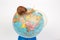 Snail and world globe model on white background. Concept travel speed