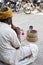 Snake charmer intertaining tourist in the streets Rajasthan Jaipur India