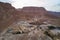 Snake trail to climb the ancient fortress of Masada. The beginning of the pedestrian road. Modern building in the desert. Judean