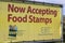 SNAP and EBT Accepted here sign. SNAP and Food Stamps provide nutrition benefits to help the budgets of disadvantaged families.