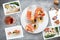 Snapshots of various sandwiches with seafood arranged on rustic wooden background with plates with food and seashells