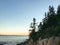 A sneak peek of the Bass Head Harbor Lighthouse during blue hour on Maine`s Mt Desert Island