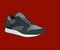 Sneakers isolated on background. icon with gray running shoes