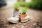 sneakers with small plants growing out, symbolic for ecotravel