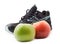 Sneakers, sports shoes and apples