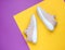 Sneakers. Sports shoes on a creative purple yellow paper background