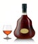 Snifter glass of cognac and bottle