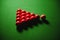 Snooker balls on green surface, shallow depth of field