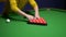 Snooker. close-up . male hands with cue playing billiards