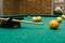 Snooker. close-up . male hands with cue playing billiards