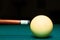 Snooker club and white ball in a billiard table