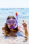 Snorkel girl with glasses and a tube for swimming on summer vacation