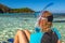 Snorkeler relaxing on tropical beach