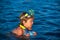 Snorkeling diving. Child dives into the water. Extreme sport. Kids summer holidays.
