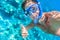Snorkeling man underwater giving thumbs up