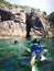 Snorkelling tourist at the caves of the Pulau Pinang on the island of Redang.