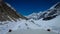 Snow-Adorned Peaks Along a Snowy, Narrow Road in Shinkula Pass