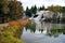 Snow and autumn colors near a high meadow pond