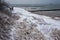 Snow on a beach and dunes - winter time