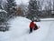 Snow blowing driveway after a Nor`easter snowstorm