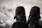 A snow boot close up. Shot of a snow on white snow background