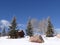 Snow bound cabin in winter landscape