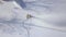 Snow cannon working on ski mountain at winter resort drone view. Aerial view snow cannon in action on mountain at ski