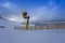 Snow canon on winter mountain ski slope