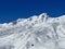 Snow-capped alpine peak Plattenhorn (2554 m) in the Plessur Alps mountain range (Plessuralpen