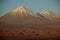 Snow-capped Chilean volcano in setting sun