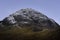 Snow capped mountain peak in Scottish highlands