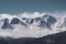 Snow-capped mountain peaks. Harsh mountain landscape