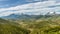 Snow capped mountains of Corsica with lush green valleys