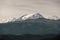 Snow capped peak of Monte Padro in Corsica