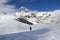 Snow-capped peak of Mount Kazbek, footpath, winter landscape