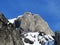 Snow-capped stone alpine peak Moor 2342 m in the Alpstein mountain range and in Appenzell Alps massif