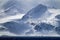 Snow capped and windblown snow of Elephant Island in Antarctica
