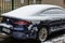 Snow on cars in the morning. Winter season  icy cars. Winter concept  frozen cars on the road in Bucharest  Romania  2021