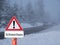 Snow chaos warning sign in german