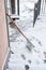 Snow cleaning shovel lean on house wall ready for cleaning entrance and stairs cold winter