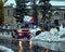 Snow cleaning tractor snow-removal machine loading pile of snow on a dump truck