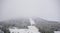 Snow and clouds obscure the view on the mountain Hovaerken in Sweden