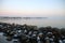 Snow coated stone pier after sunset