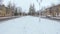 Snow-covered alley in the old part of the housing estate Pridneprovsk