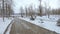 Snow-covered alley in the old part of the housing estate Pridneprovsk