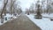 Snow-covered alley in the old part of the housing estate Pridneprovsk